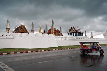 The landscape of the Grand Palace and the Temple of the Emerald Buddha in Bangkok on a cloudy day over this area is one of Thailand's most popular tourist attractions.