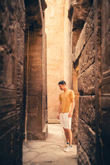 Obraz na płótnie Canvas young male traveler visits Karnak temple in Luxor, Egypt