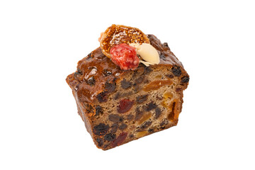 A cake with dried fruits, raisins almonds, dried strawberry.