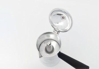 Moka pot Italian coffee maker, isolated on white background with copy space. Moka Coffee.