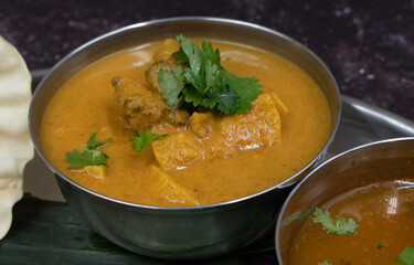 Close up Indian bowl with curry, gravy