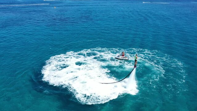 Fly boarding and sea riding in a sunny summer day, Zakynthos, Greece