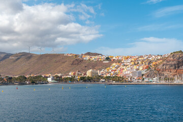 Fototapeta premium View of the city and the port of San Sebastian de la Gomera seen from the ferry heading to Tenerife. Canary Islands