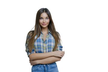 Horizontal shot of attractive young female with long straight hair, wears checkered shirt, jeans, keeps hands crossed, has clean skin, minimal makeup, expresses positive emotions, enjoys photo session