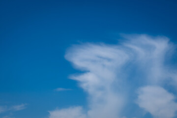 Obraz premium fluffy cirrus clouds in the blue sky. 