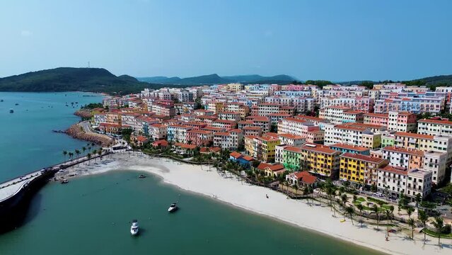 Aerial 4K footage of Sunset town in Phu Quoc island, Vietnam. Fast being developed European city copy. Amazing future resort, Kien Giang province