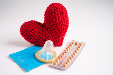 Birth control pills and condom, contraception health and medicine.