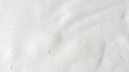 Fototapeta na wymiar Abstract background white soapy foam texture. Shampoo foam with bubbles