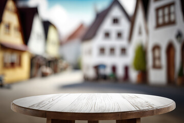 empty table top with blurry backdrop of bavarian village, ai generated - obrazy, fototapety, plakaty