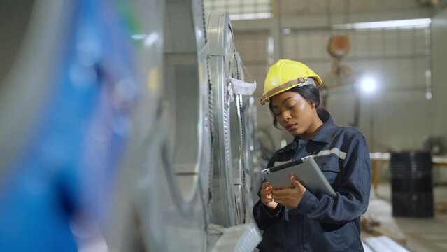 Engineer woman examining and measuring steel at lathe factory, worker or technician check and maintenance metal with professional, industry and machinery concept.