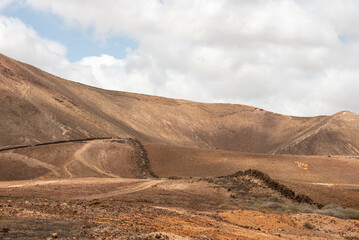 Typical Lanzarote landscape. View on Montana de Tinaguache volcano near Costa Teguise. Canary Islands. 