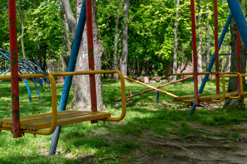 Very old swing on the playground