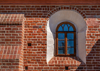 Fototapeta na wymiar General view and architectural details of the chapel and the catholic church consecrated in 1547 of St. Adalbert the Bishop and Martyr in Szczepankowo, Podlasie, Poland.
