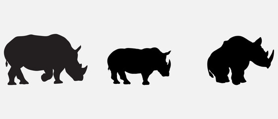 isolated black silhouette of a rhinoceros , vector collection