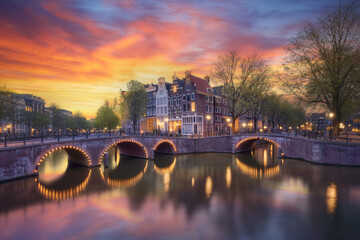 Panoramic view of the historic city center canals of Amsterdam at sunset. Traditional houses and...
