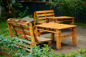 furniture from construction pallets in an outdoor terrace cafe
