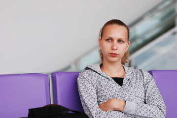 Fototapeta premium Woman at the airport, shallow DOF
