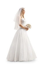 Fototapeta na wymiar Full length profile shot of a bride with a veil holding a bridal bouquet