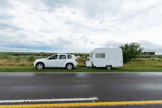 Car Transporting A Trailer On The Side Of The Road, No People, Country Scenery