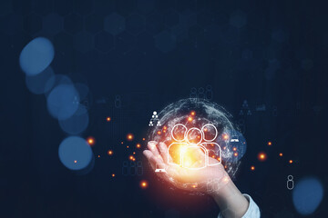 Technology customer relationship management digital online. A man holding virtual human icon with...
