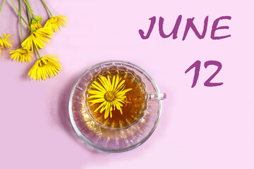 Calendar for June 12: a cup of tea with yellow daisies, a bouquet of daisies on a pastel background, the numbers 12, the name of the month of June in English