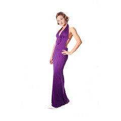 Portrait of young beauty in violet dress isolated