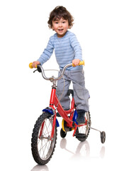 lLttle boy riding bicycle