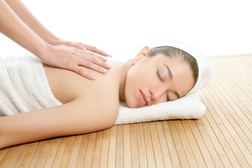 Beautiful woman on spa massage on her back