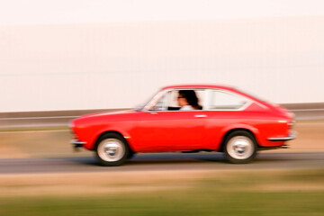 Red Car  moving fast