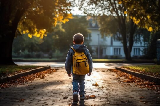 Little Boy Walking Back To School From Behind. Generative AI