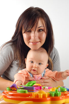 attractive brunette woman with baby girl
