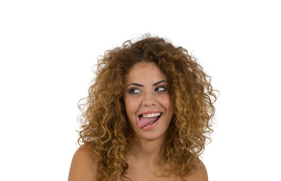 woman teasing with tongue on isolated studio picture