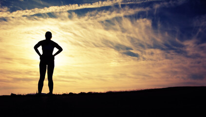 Fototapeta na wymiar Beautiful young woman runner having a workout session.