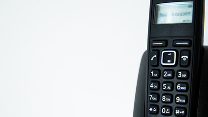 Close up of a house phone on white background with copy space for text