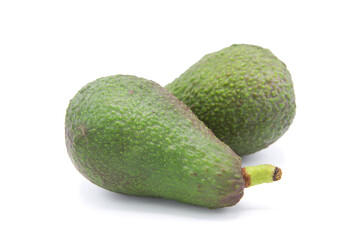 Whole ripe organic avocado isolated on white background.	