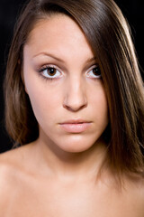 Fototapeta premium portrait of pretty young brunette woman