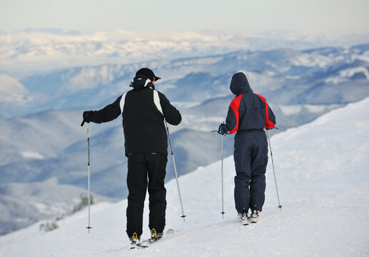 skiers group of+have fun and relaxation on winter mountain