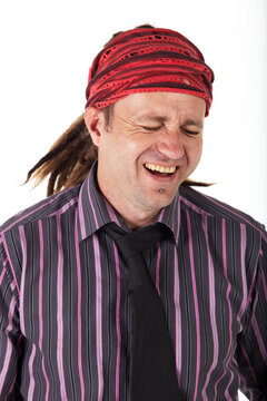 Adult caucasian man with dreadlocks and casual wear on a white background in various poses and facial expressions. Not Isolated
