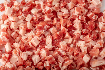 Diced bacon as full frame background texture