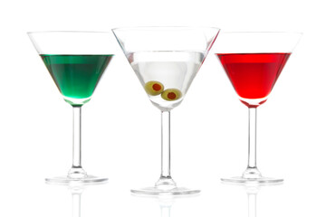 Stock image of Martinis over white background, includes, appletini, red apple martini  and dry martini, colors based on the flags from Mexico, Ireland, and Italy.