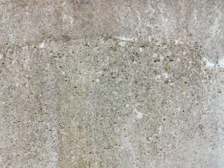 The grunge texture is an old gray concrete wall.