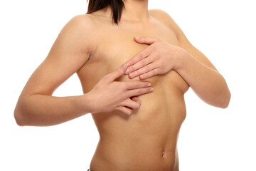 Breast cancer exam - Woman holding her breast