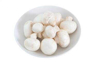 Mushrooms in a White Plate. Isolated on White