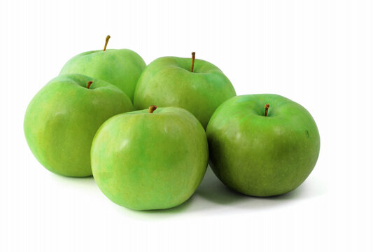 isolated five green apples on white background