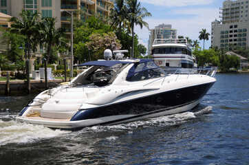 Fototapeta na wymiar Motorboat on a waterway in Fort Lauderdale, Florida