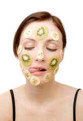 Young Woman with Fruit Mask on Her Face