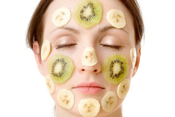 Young Woman with Fruit Mask on Her Face