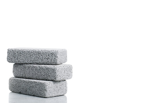A stack of pumice stones against a white background.