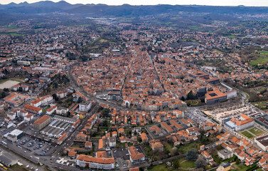 Aerial view around the old town of the city Riom in France on a sunny day in early spring	
