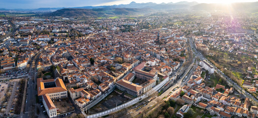 Aerial view around the old town of the city Riom in France on a sunny day in early spring	

